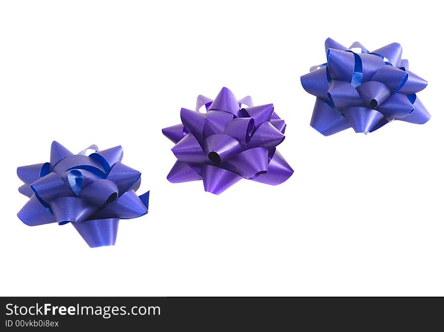 Violet and blue bows to be used in placing on top of items - gifts, products, etc.