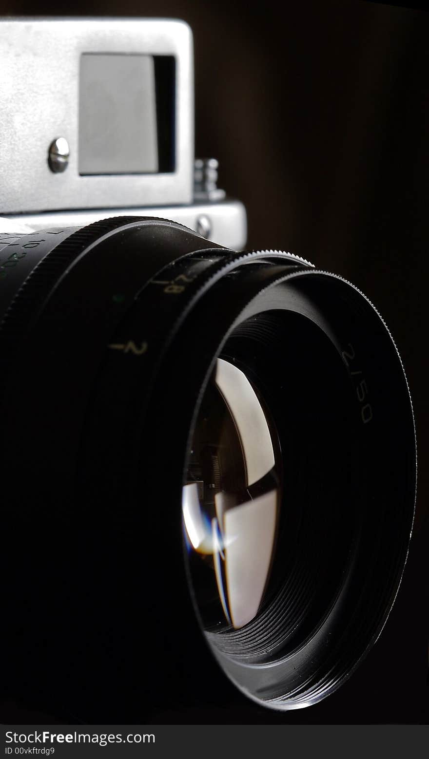 A close up on lens of rangefinder camera. A close up on lens of rangefinder camera