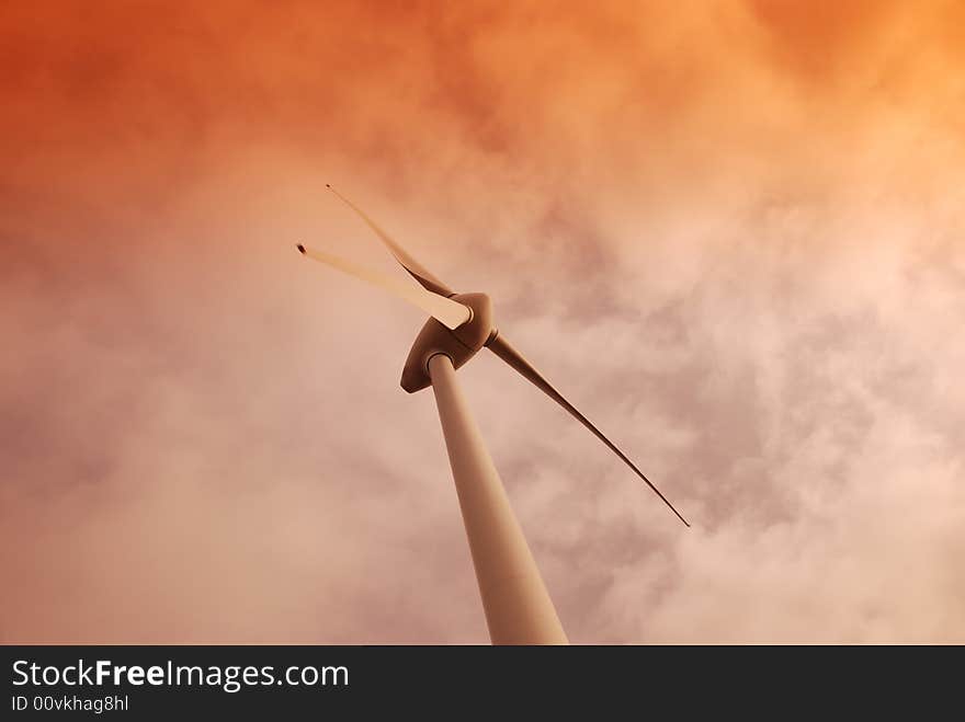 Wind turbine propeller and a sunset sky. Wind turbine propeller and a sunset sky