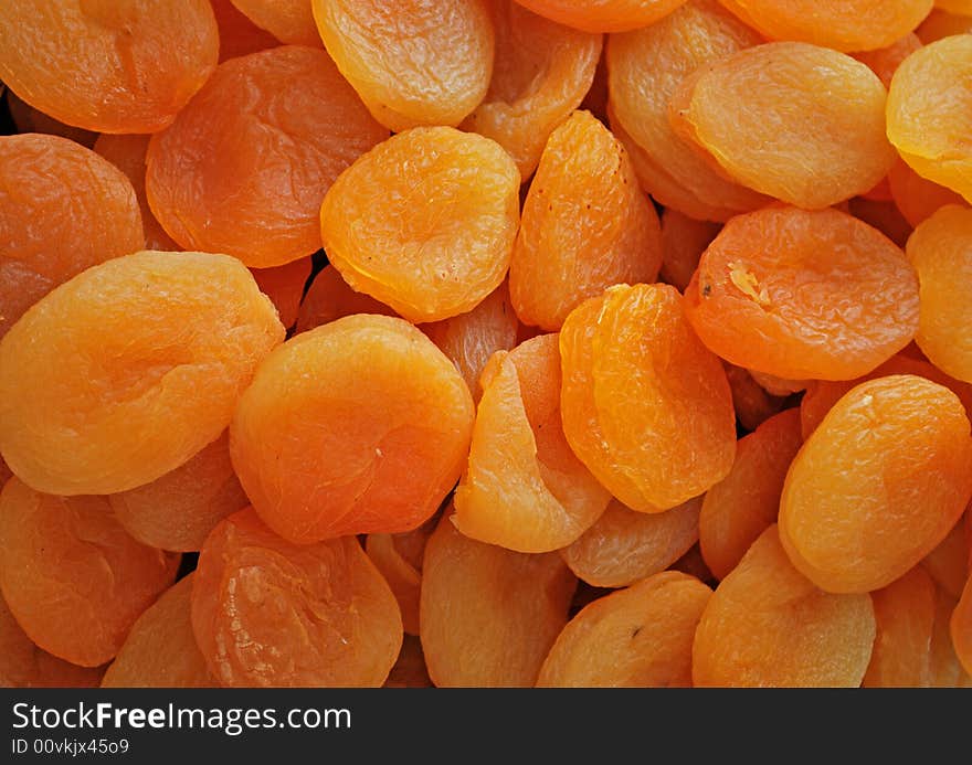 Dried apricots close up in orange color