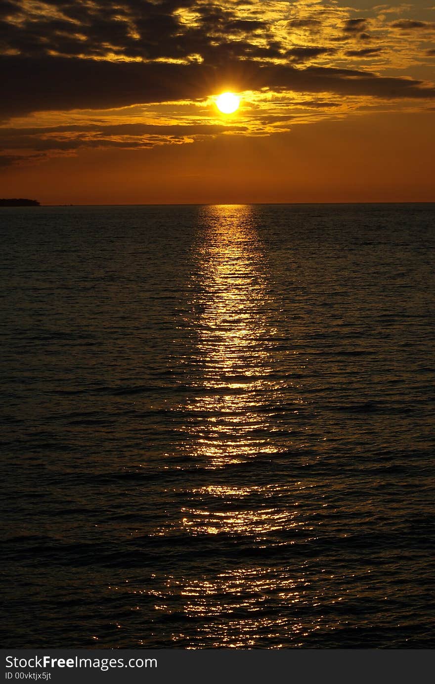 Golden sunset over water