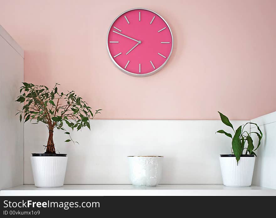 Decoration with pink wall clock. Decoration with pink wall clock