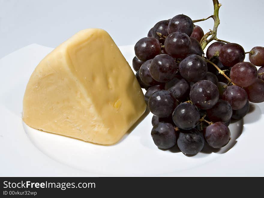 Wedge of Cheese and Grapes