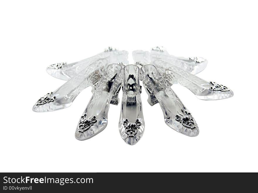 Crystal slippers arranged in a circle with silver accents. Crystal slippers arranged in a circle with silver accents