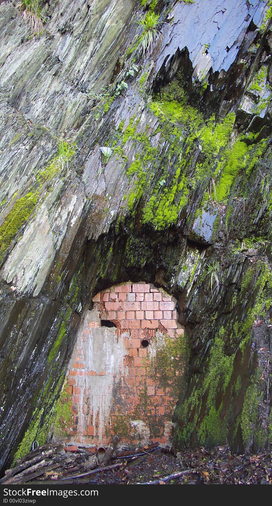 Old stone pit with closed entrance. Old stone pit with closed entrance