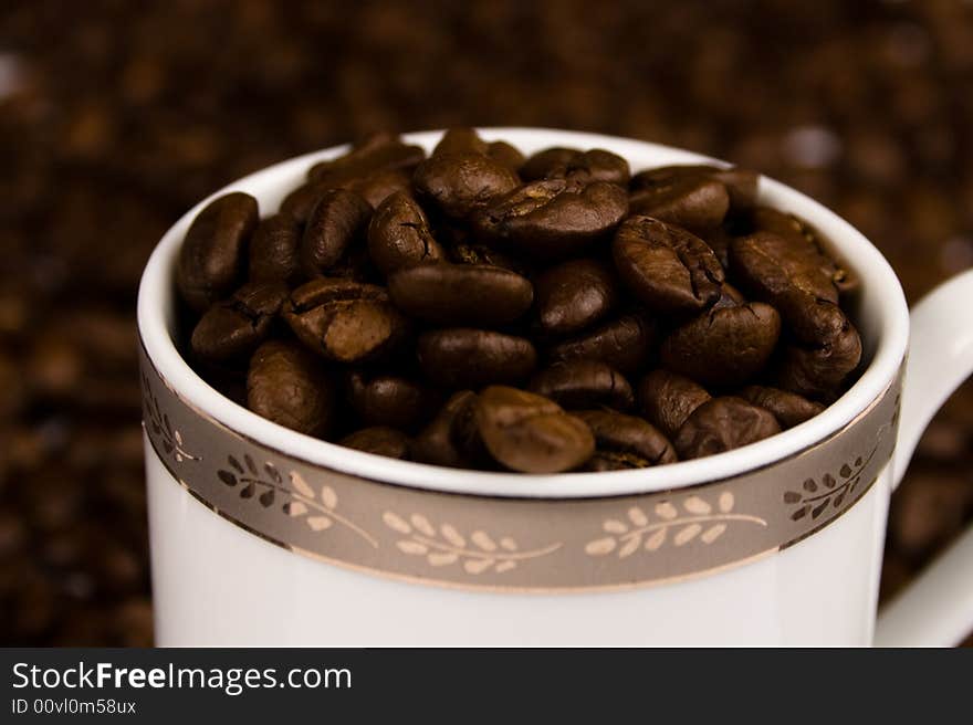 Close up pictures of spilt coffee beans. Close up pictures of spilt coffee beans