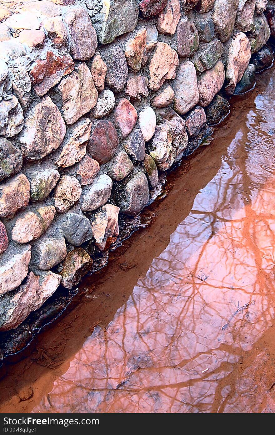 Natural stony stream in a wood. Natural stony stream in a wood.