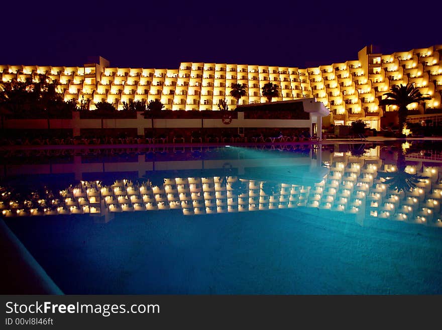 SPA resort with a girl in a pool in the front. SPA resort with a girl in a pool in the front