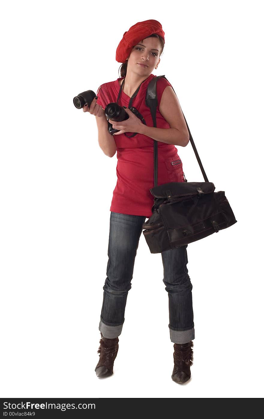 Young woman with digital camera and lenses taking picture. Young woman with digital camera and lenses taking picture