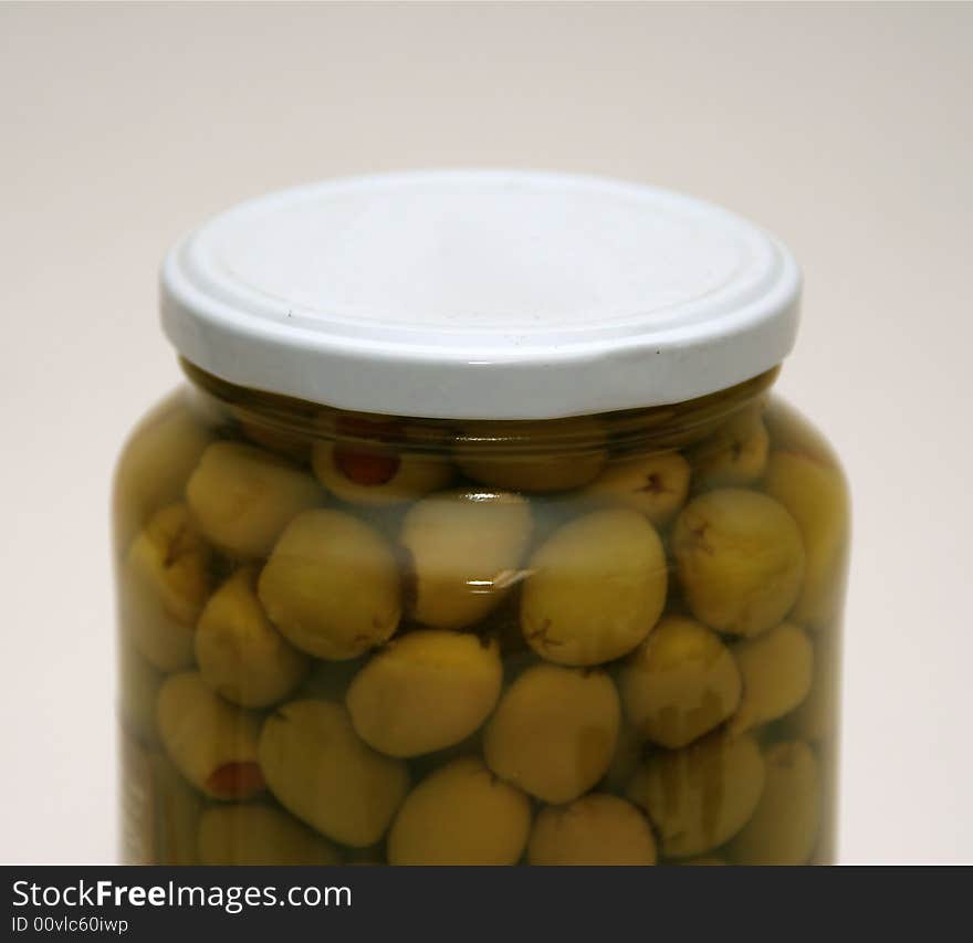 Olives with paprika in a glass