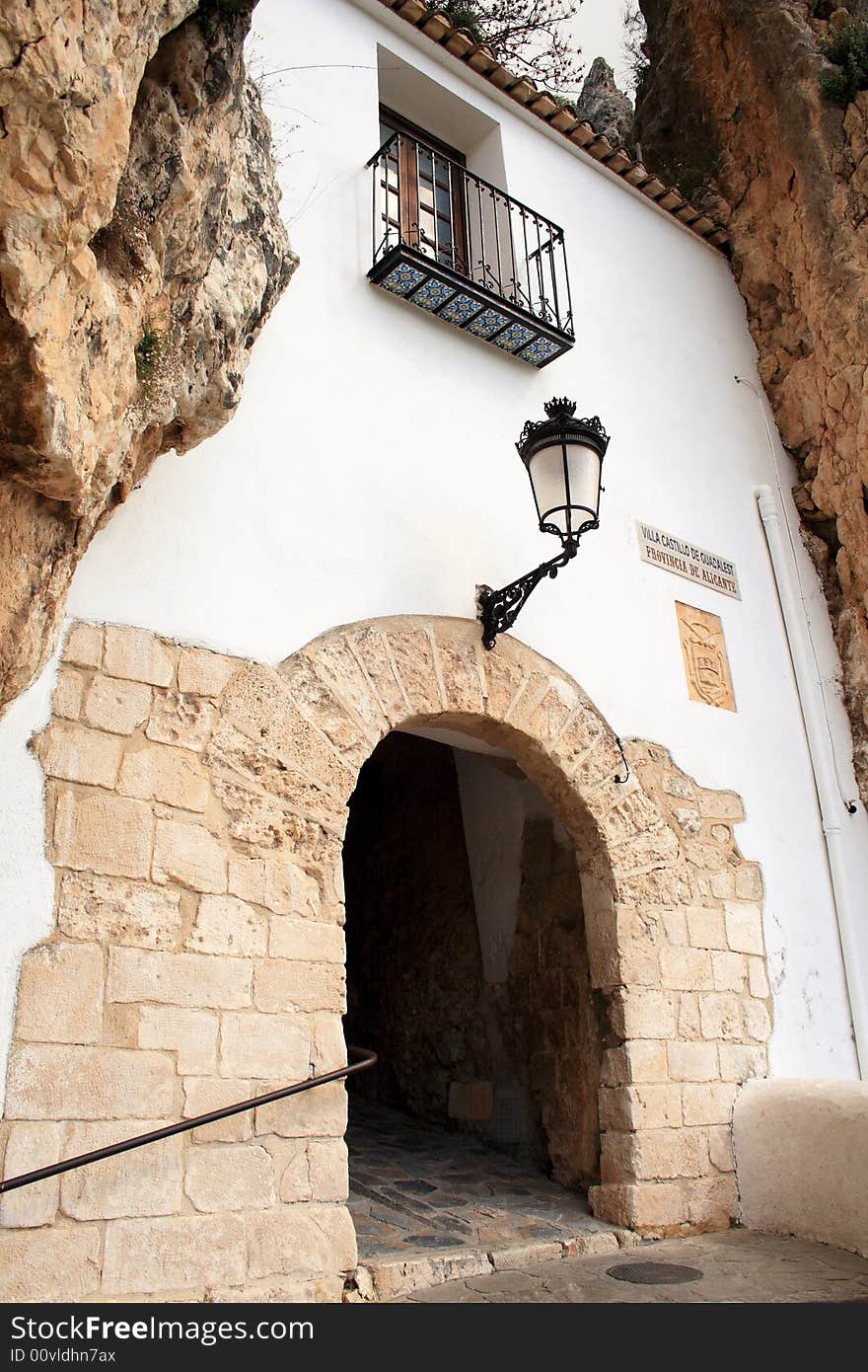 Equipment Canon EOS400D. This amazing arched passageway is the enterence to Guadalest and is built into the mountain face itself. Guadalest is the most visited village in the Valencia region of Spain. Equipment Canon EOS400D. This amazing arched passageway is the enterence to Guadalest and is built into the mountain face itself. Guadalest is the most visited village in the Valencia region of Spain.