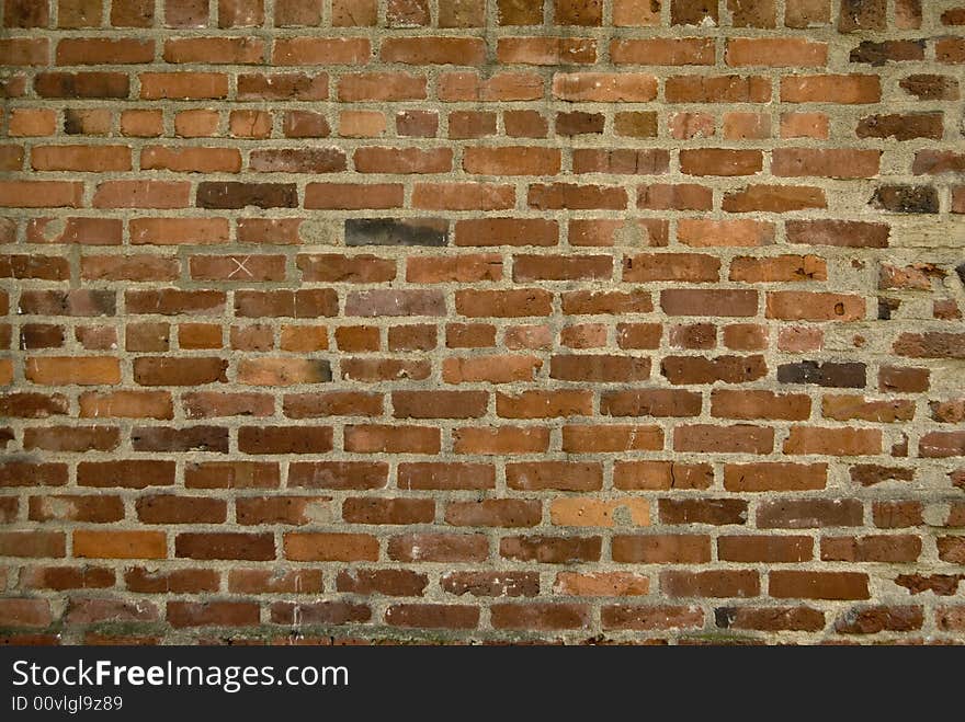 Multi colored brick wall that could be used for a background. Multi colored brick wall that could be used for a background