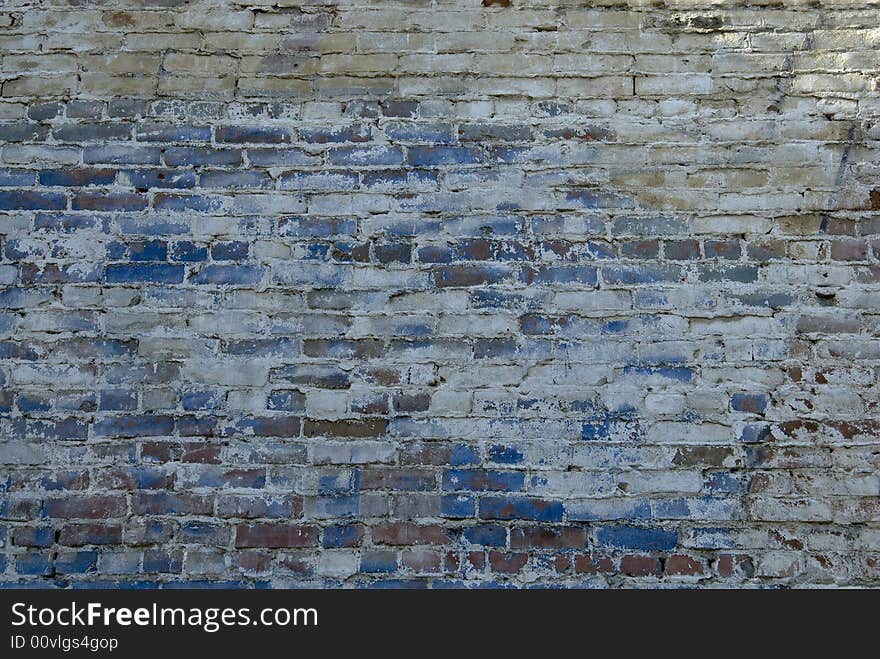 Multi colored brick wall that could be used for a background. Multi colored brick wall that could be used for a background