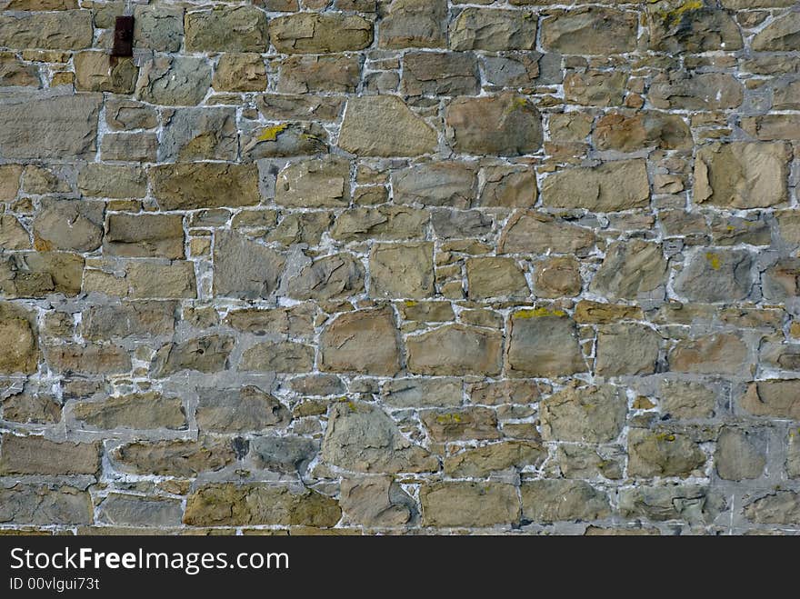 Multi colored brick wall that could be used for a background. Multi colored brick wall that could be used for a background