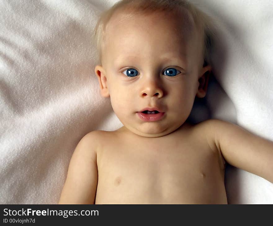 Portrait of a baby boy on white background