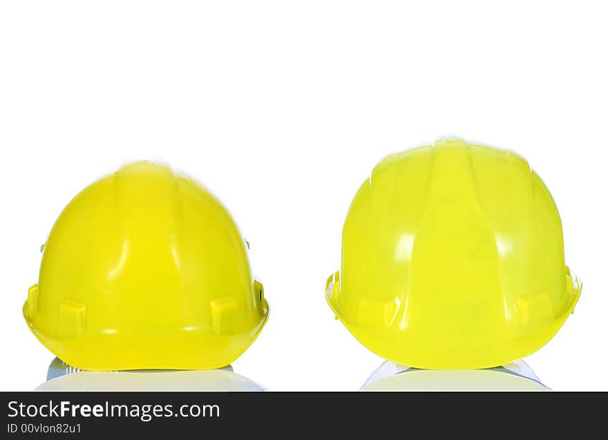 Two yellow helmet on white background