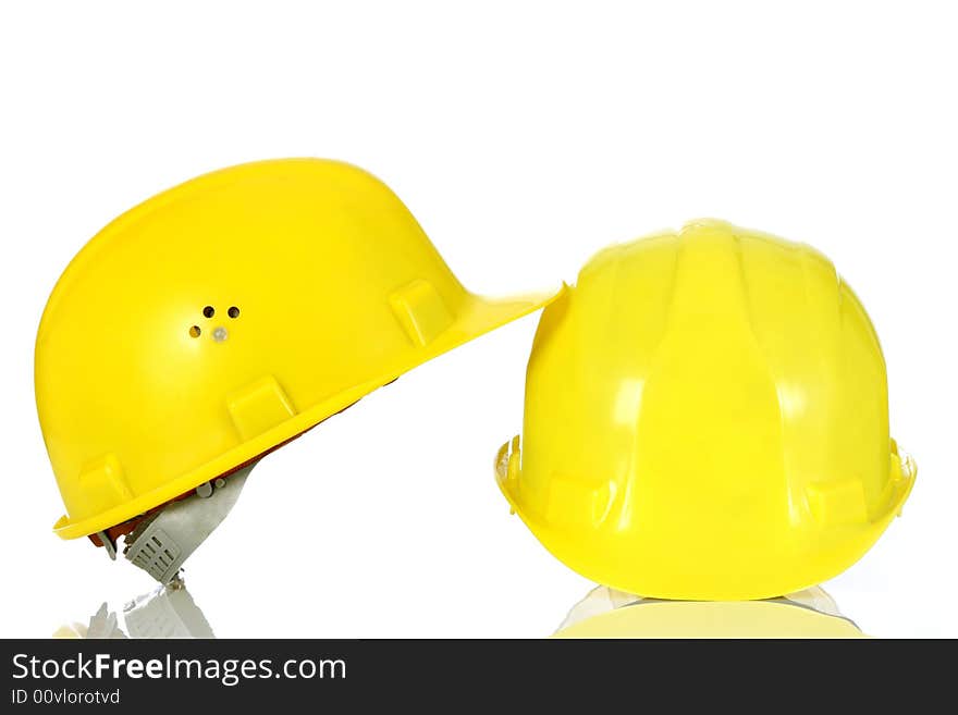 Two yellow helmet on white background