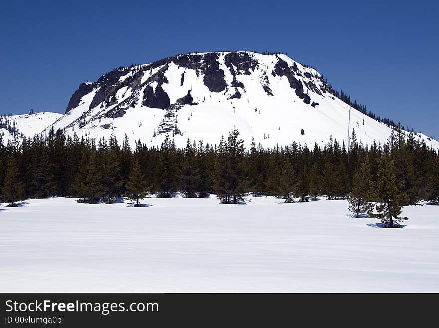 A snow covered butte in the Cascade mountains of Oregon. A snow covered butte in the Cascade mountains of Oregon