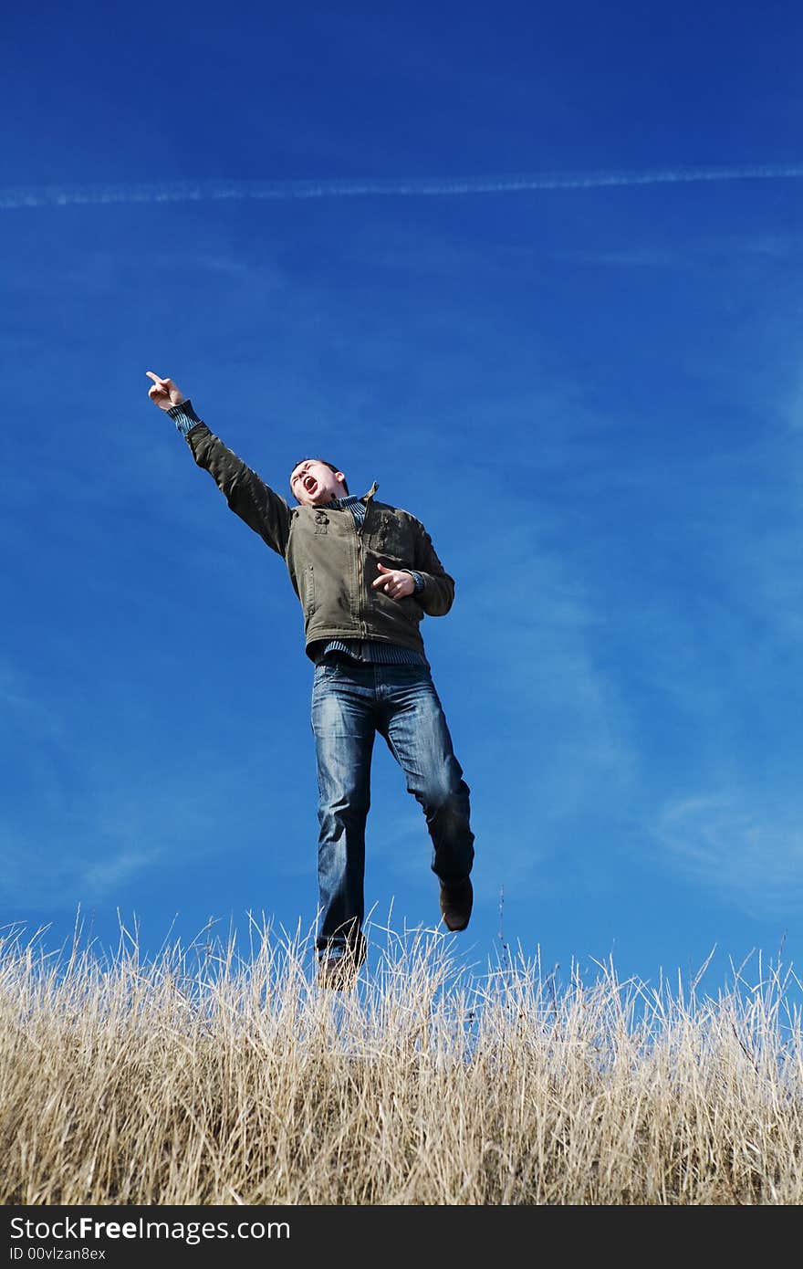 Flying Man Over The Field