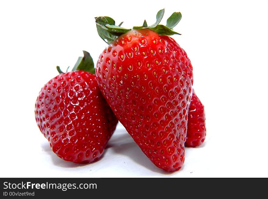 Three Strawberries in white background