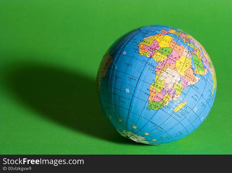 a globe on the green background