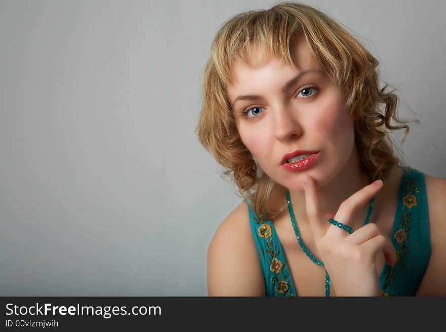 Beauty woman portrait on gray