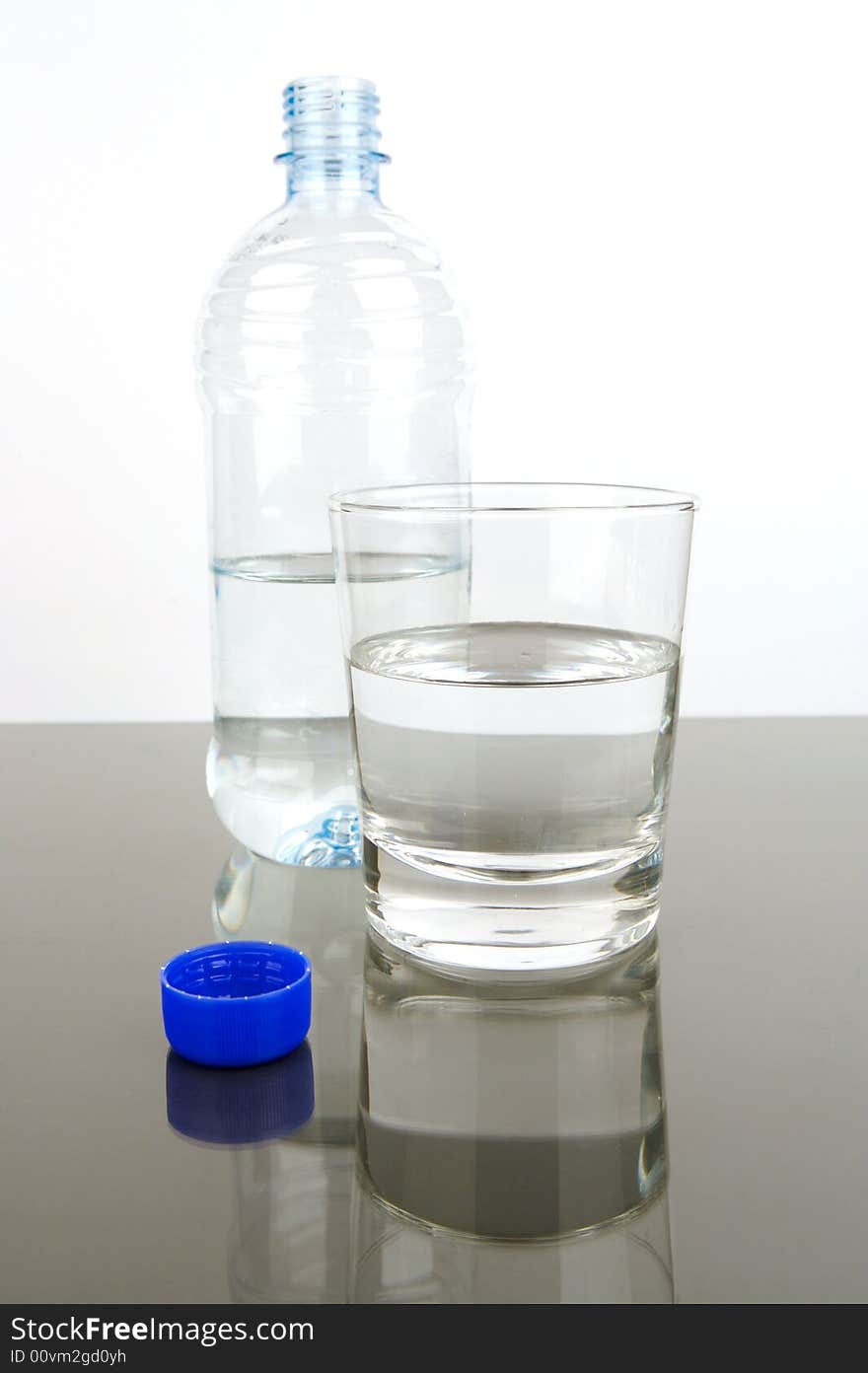 Bottled drinking water isolated against a white background. Bottled drinking water isolated against a white background