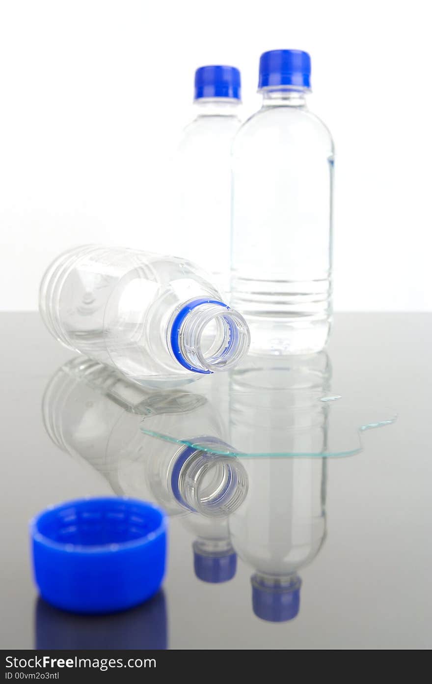 Bottled drinking water isolated against a white background. Bottled drinking water isolated against a white background