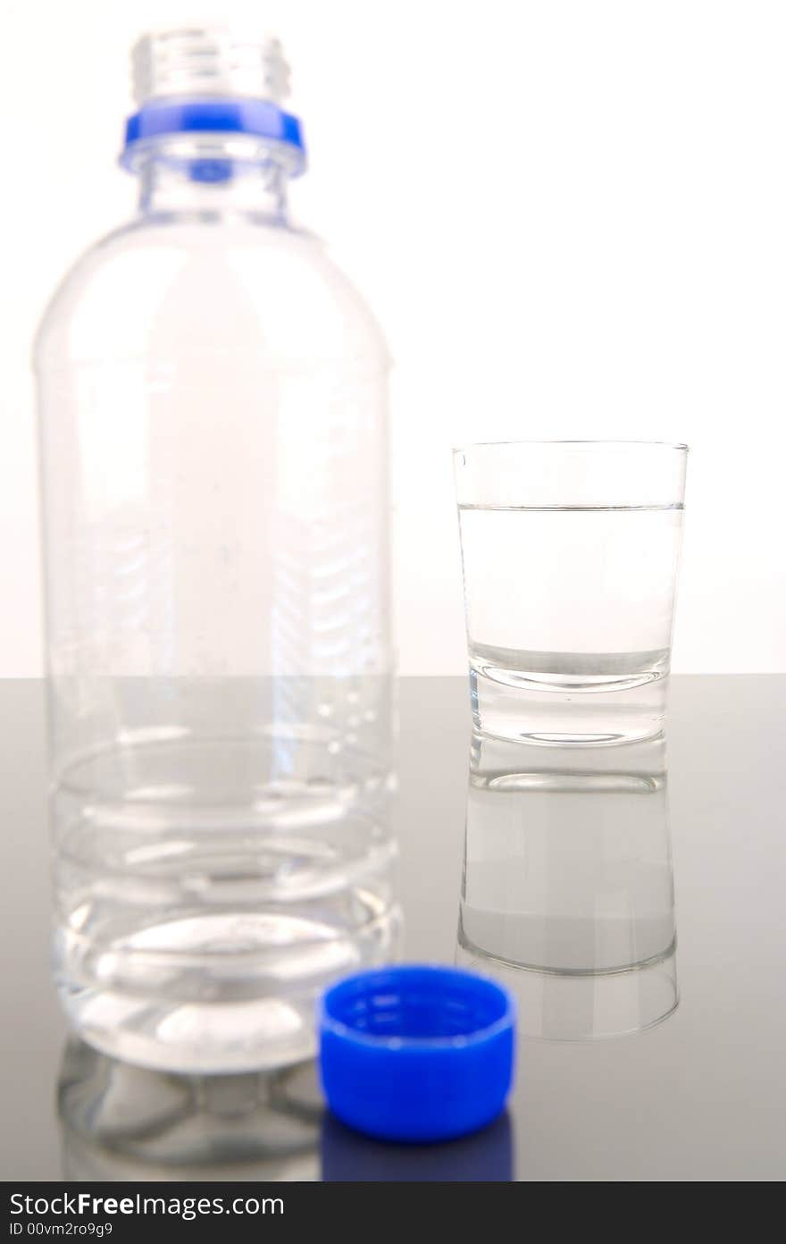 Bottled drinking water isolated against a white background. Bottled drinking water isolated against a white background