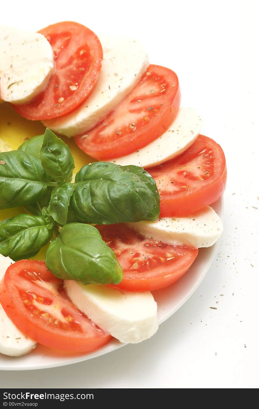 Mozzarella cheese, tomato and fresh basil. Mozzarella cheese, tomato and fresh basil.