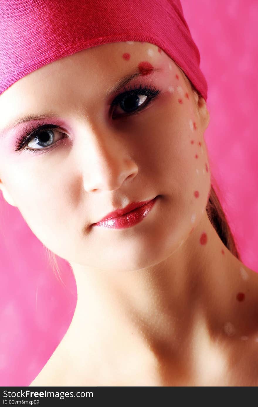 Beauty portrait of a woman in pink