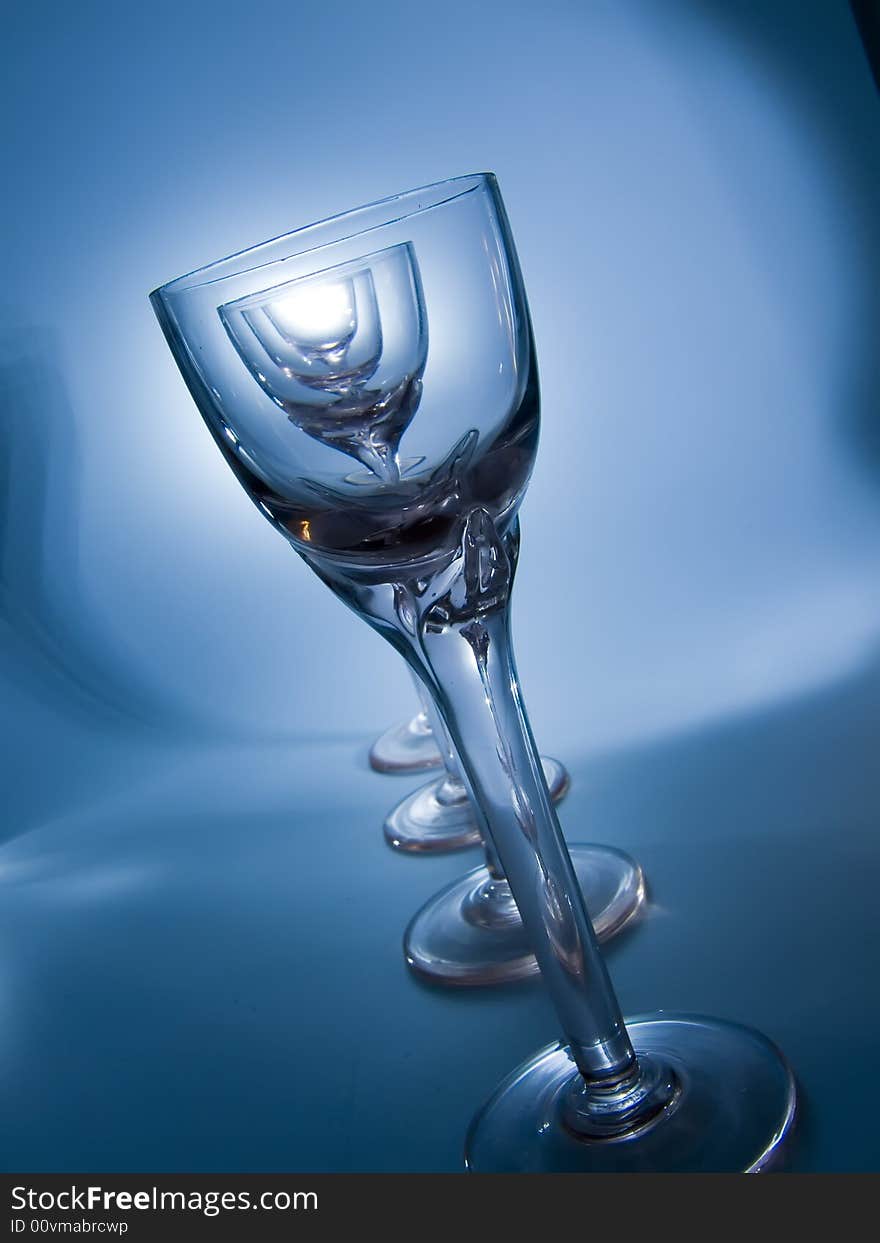 Four glass on the blue background. Four glass on the blue background