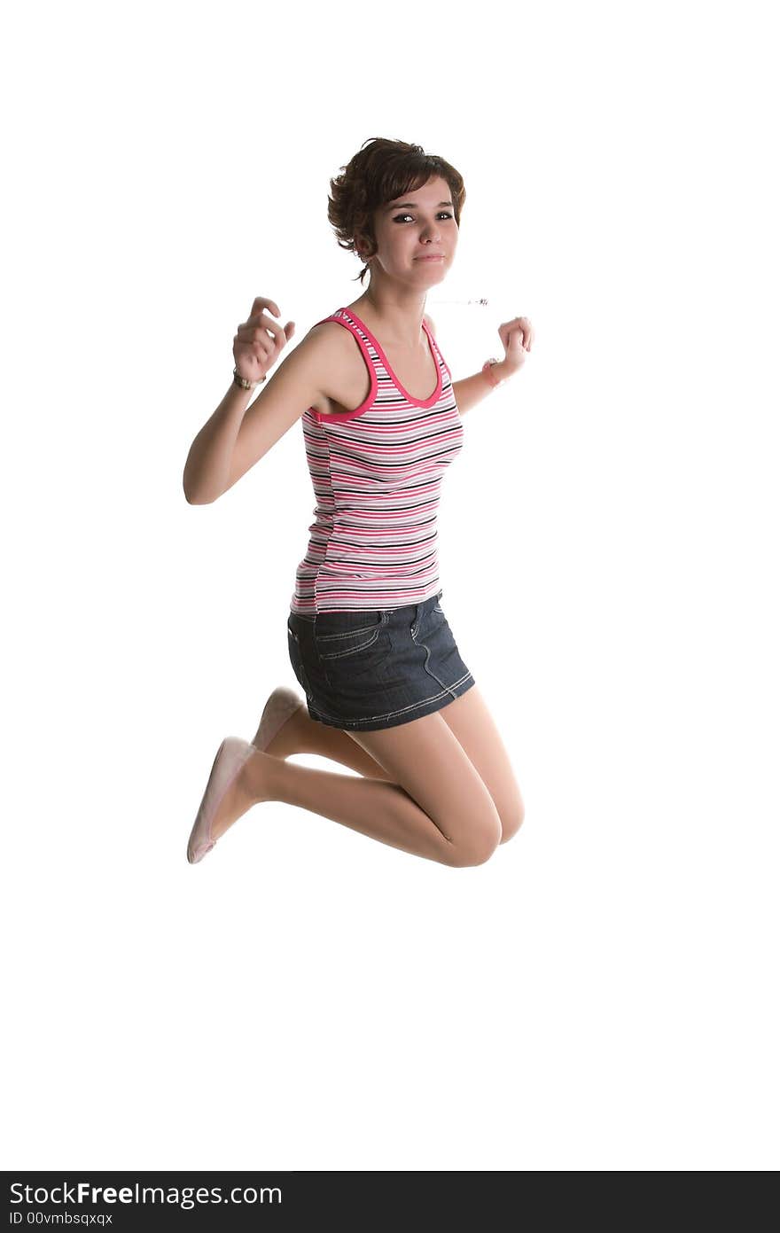 Young attractive girl jumping isolated on a white background