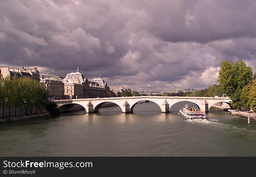 Boat Under A Paris Bridge