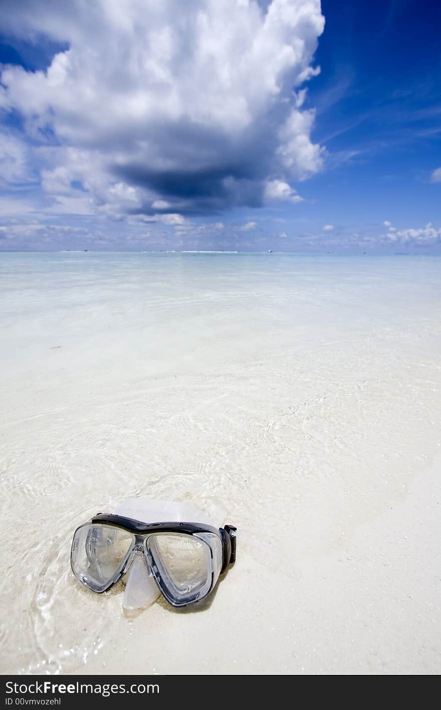 Diving mask on beach