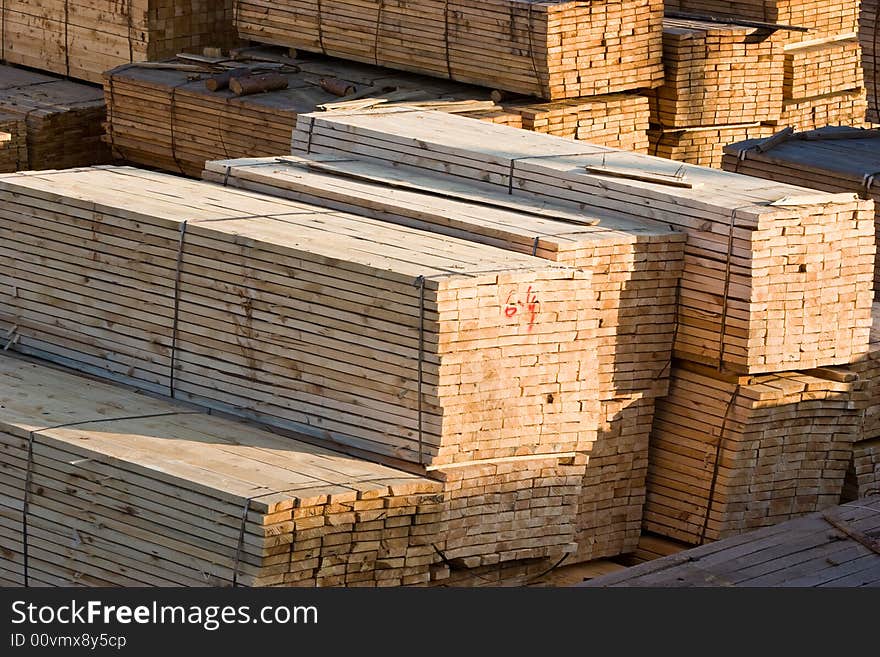 Industrial series: wooden warehouse with pile of board