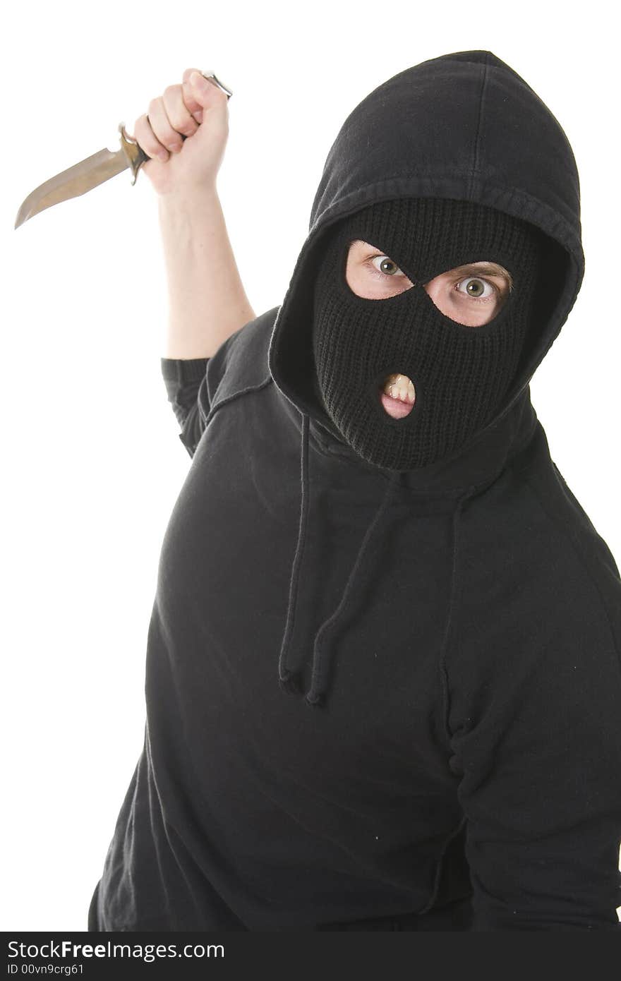 Evil criminal wearing balaclava with a knife