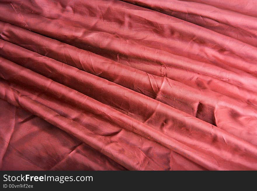 Abstract background red fabric with waves. Abstract background red fabric with waves