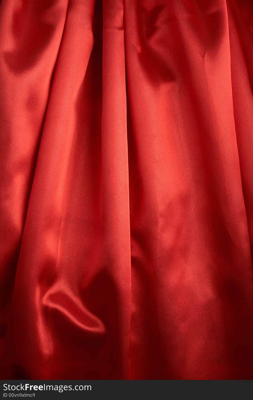 Abstract background red silk fabric with waves. Abstract background red silk fabric with waves