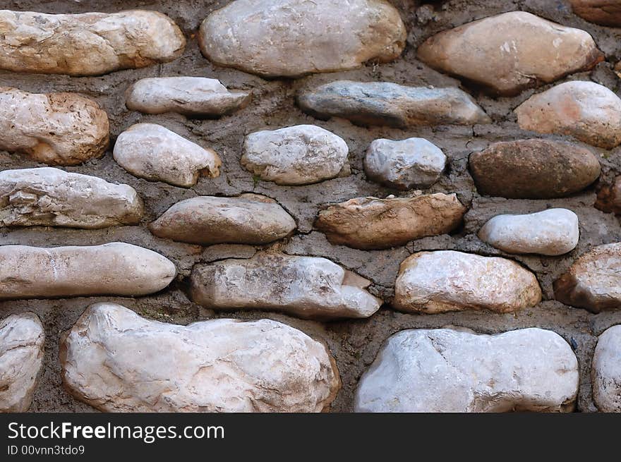 Close-up of rural stone-work. Texture. Close-up of rural stone-work. Texture.