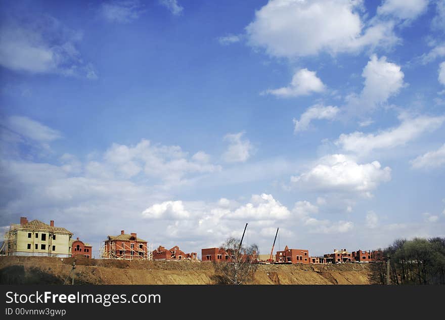 Suburban construction of small house on embankment