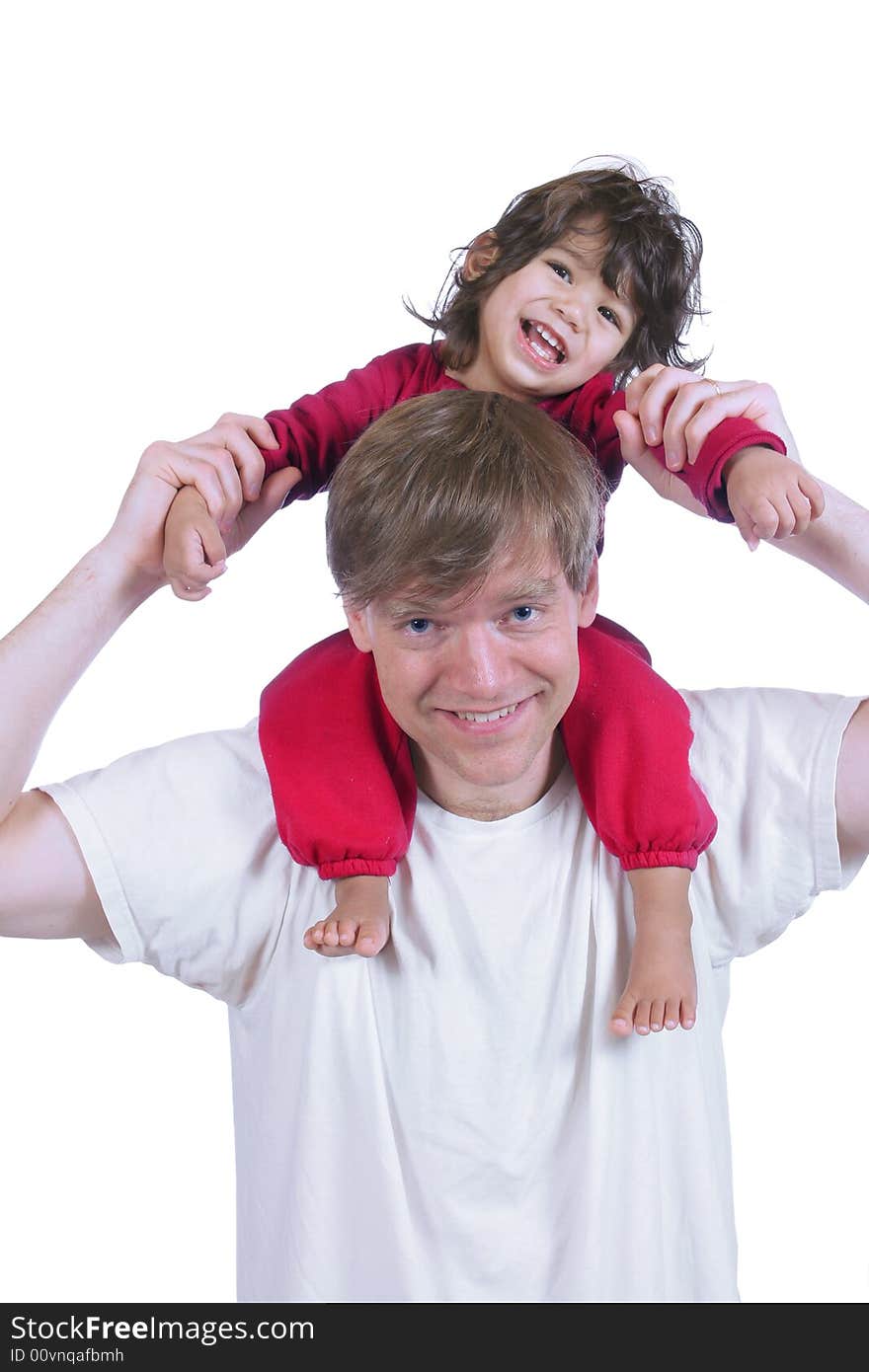 Father Carrying Son On His Shoulders