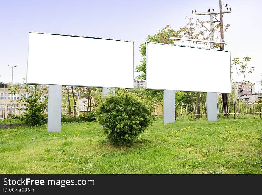 Blank billboard out of city