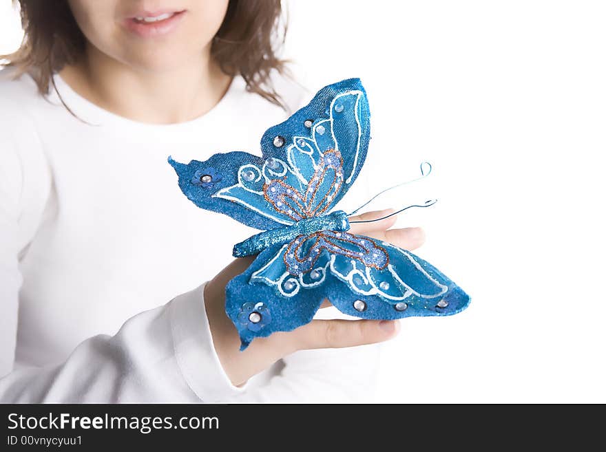 Young woman holding blue butterfly isolated on white background