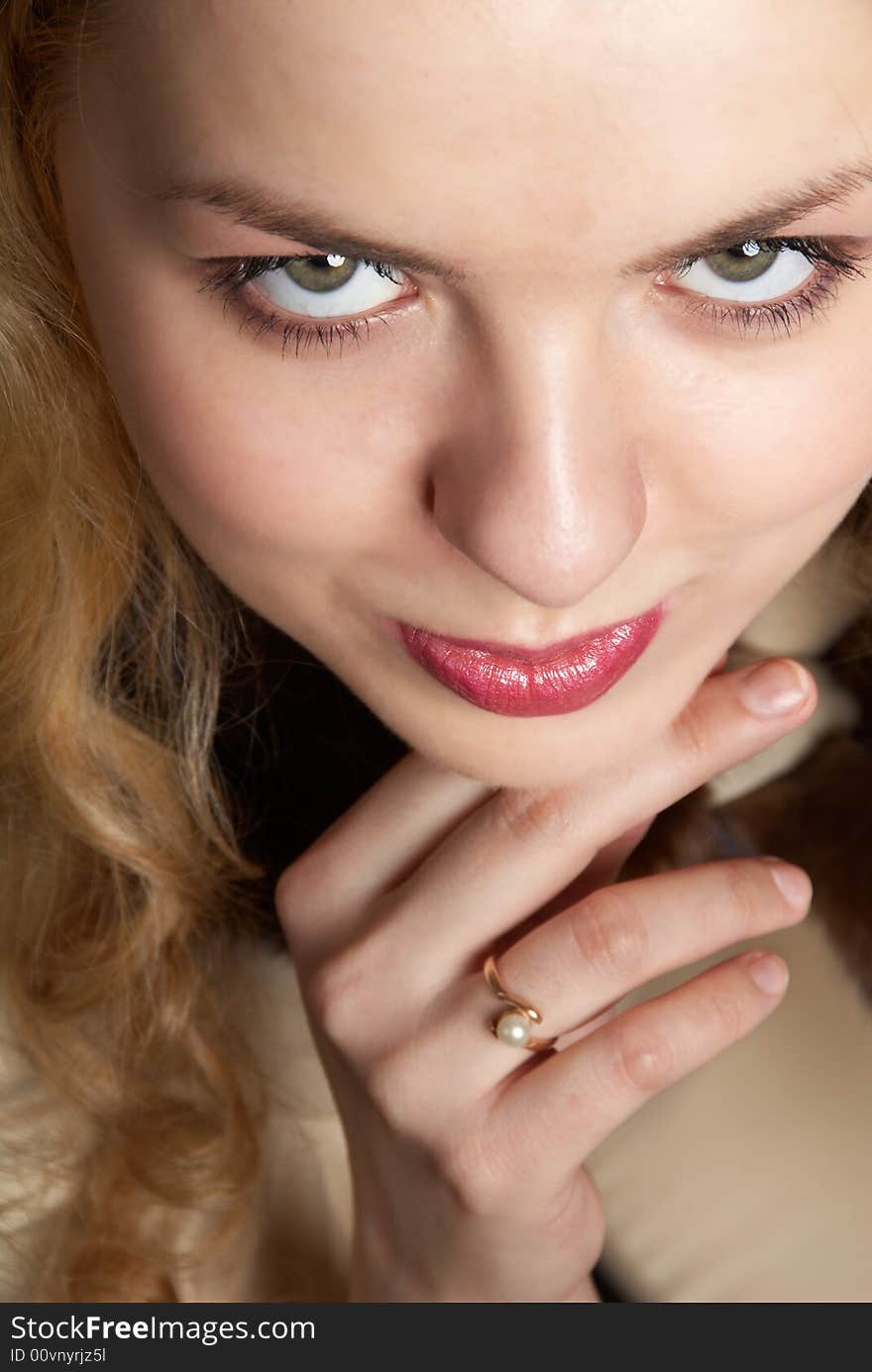 Girl looking upward with interest and little smile