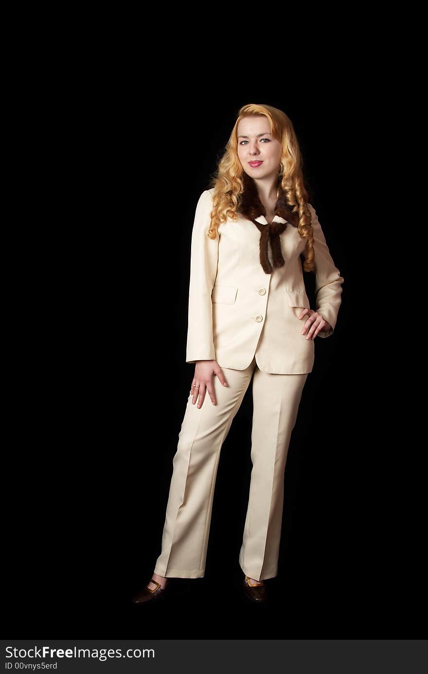 Girl In Suit On Black Background.