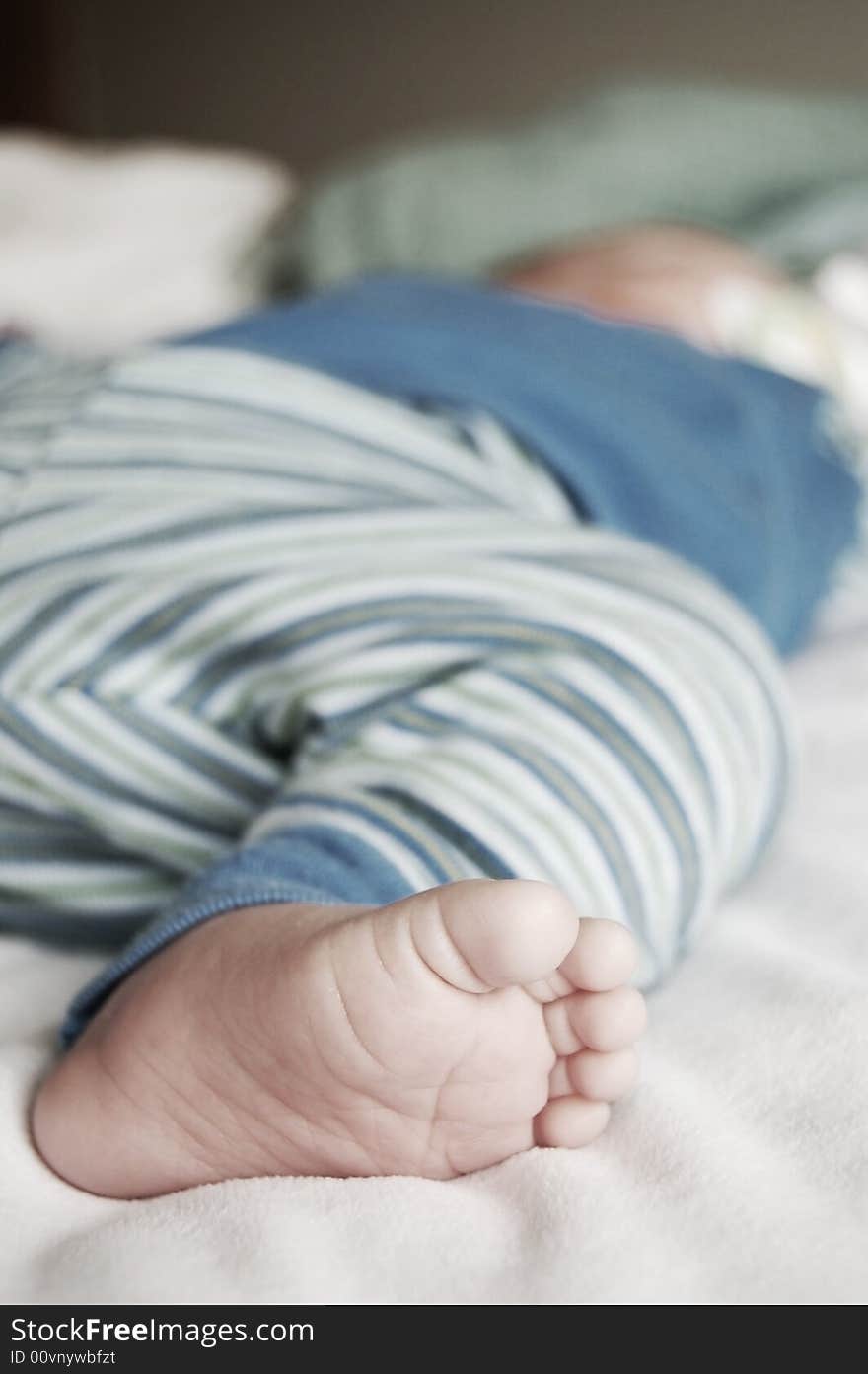 Small toes of a baby sound asleep. Small toes of a baby sound asleep