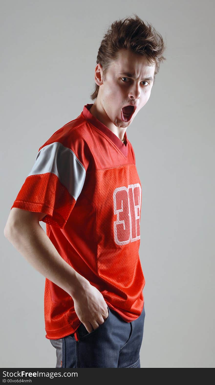 Young man in a red t-shirt