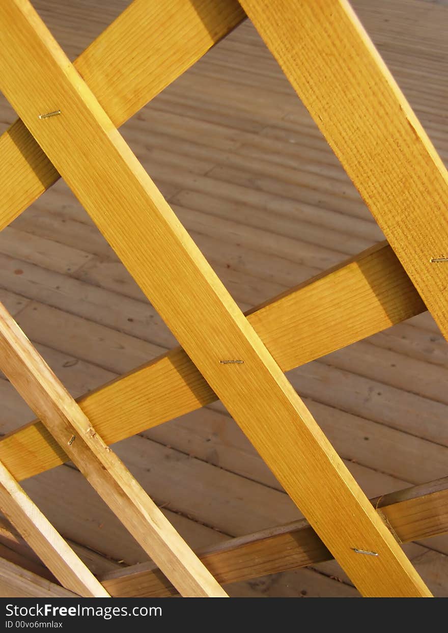 Detail of the gazebo, wood deck floor boards and climbing flowers boards *RAW format available. Detail of the gazebo, wood deck floor boards and climbing flowers boards *RAW format available