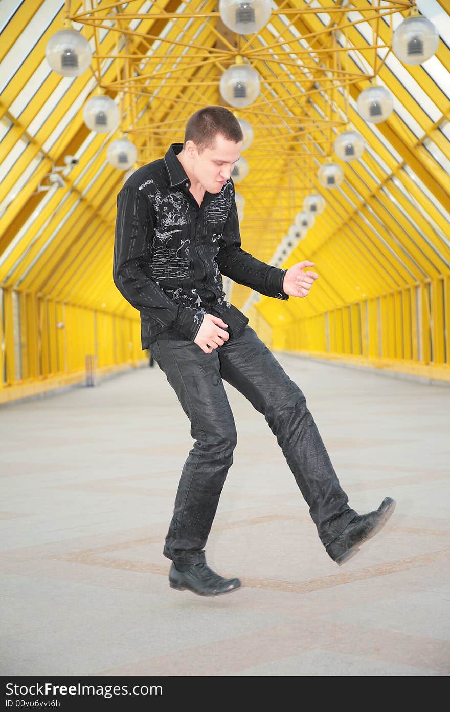 Guy allegorize play on guitar on footbridge. Guy allegorize play on guitar on footbridge